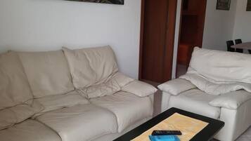 Apartment, 2 Bedrooms | Living area | 22-inch flat-screen TV with cable channels, LCD TV