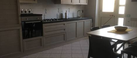 Apartment, 2 Bedrooms | Private kitchen | Full-size fridge, microwave, oven, stovetop