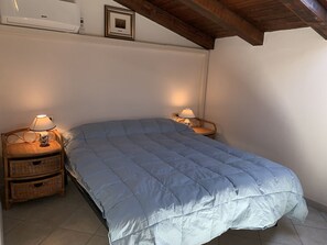 Apartment, 2 Bedrooms | 2 bedrooms, individually decorated, individually furnished - Appartamento I Gerani 3 San Teodoro Centro (San Teodoro)