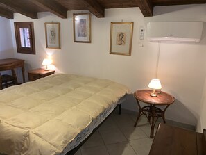 Apartment, 2 Bedrooms | 2 bedrooms, individually decorated, individually furnished - Appartamento I Gerani 3 San Teodoro Centro (San Teodoro)