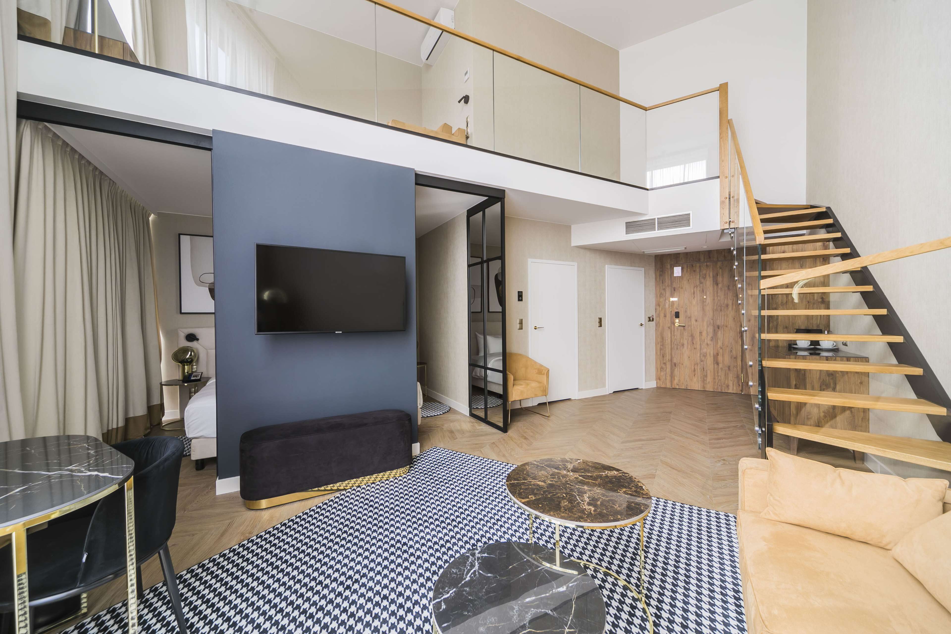 Premium Suite, Balcony | Minibar, in-room safe, desk, blackout drapes