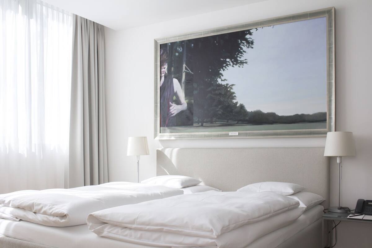 Apartamento superior | Roupas de cama premium, edredons de pluma, cofres nos quartos