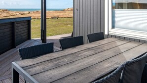 Hus | Utsikt mot vann