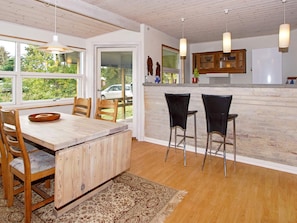 Enjoy cooking in this kitchen with a large island, sink, and ample storage.