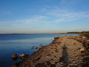 A rocky shoreline with calm water and a clear sky. - Vibrant Holiday Home in Tarm near Sea (Hemmet)