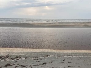 A beach with a calm sea and a clear sky. - 4 Star Holiday Home in Albaek (Aalbaek)
