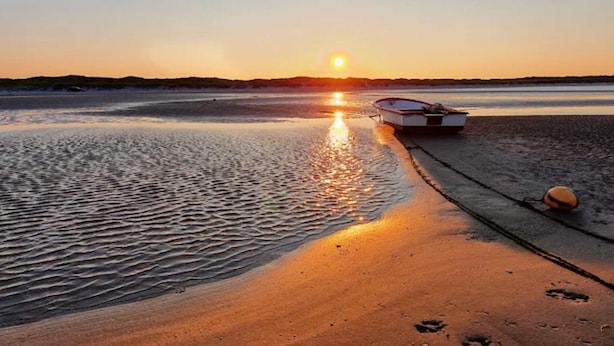 A boat on a calm body of water during sunset. - 4 Star Holiday Home in Albaek (Aalbaek)