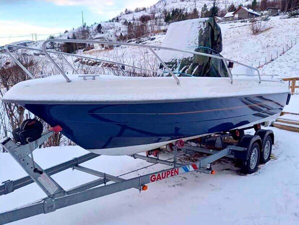 A boat on a trailer in a snowy outdoor setting. - 8 Person Holiday Home in Revsnes (Åfjord)