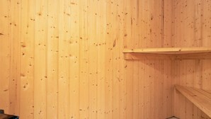 A room with wooden walls and a tiled floor. - 4 Star Holiday Home in Laeso (Læsø)