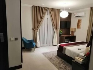 1 bedroom, desk, laptop workspace, iron/ironing board
