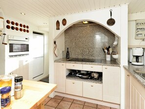 Coffee/tea maker, fridge, stovetop, dishwasher