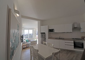 Apartment, 2 Bedrooms, Terrace, Partial Sea View | Private kitchen | Full-size fridge, microwave, stovetop, coffee/tea maker