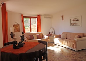 Apartment, 2 Bedrooms, Patio, Sea View | Living area | 32-inch flat-screen TV with digital channels, TV - Leli (La Maddalena)