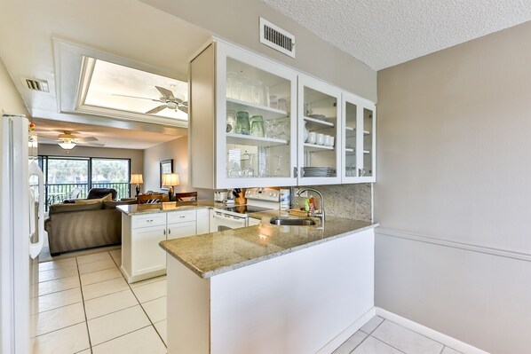 Fridge, oven, stovetop, dishwasher - Sandpebble 2F - Beautiful Sanibel Condo Across from the Beach (Sanibel)