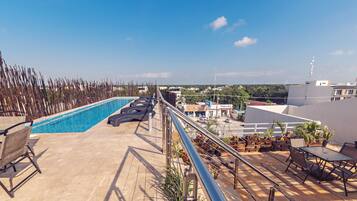 Outdoor pool, open 8:00 AM to 9:00 PM, pool umbrellas, pool loungers