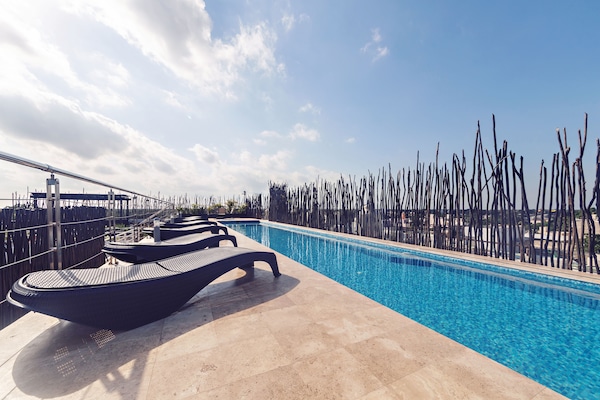Outdoor pool, open 8:00 AM to 9:00 PM, pool umbrellas, sun loungers