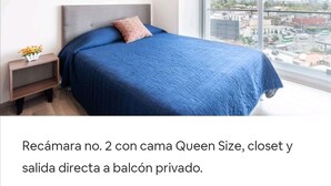 A bedroom with a Queen-sized bed, a closet, and a private balcony. - San Angel - UNAM Beautiful Apartment - 2 parking/3BR/2BA (Ciudad de México)