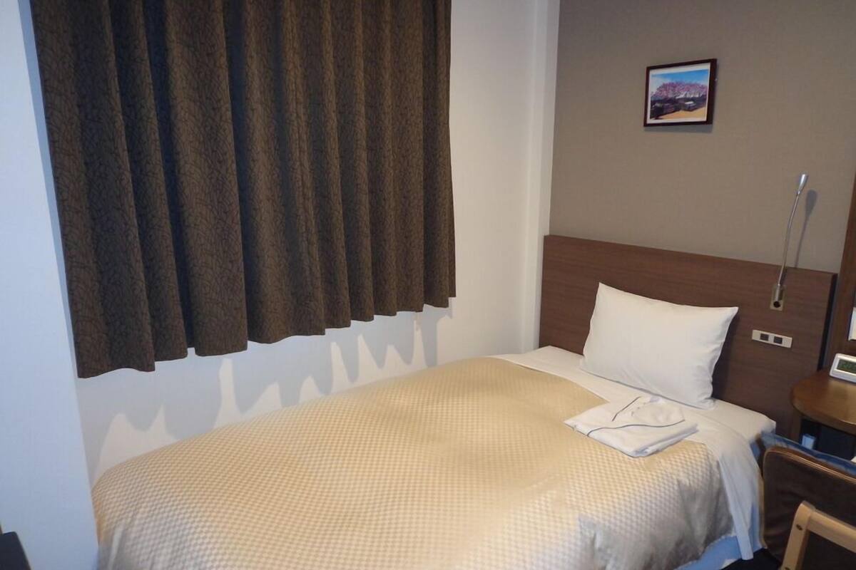 Down comforters, desk, blackout drapes, soundproofing