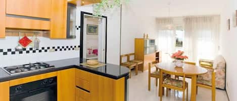 Apartment, 2 Bedrooms (27) | Private kitchen | Full-size fridge, microwave, stovetop, cookware/dishes/utensils