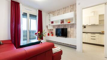 Appartement, 1 chambre | Coin séjour | Télévision à écran plat