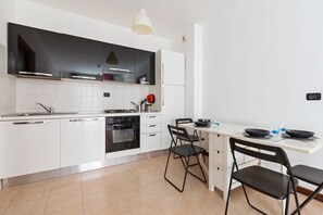 Apartment, 1 Bedroom | Private kitchen | Full-sized fridge, oven, stovetop, cookware/dishes/utensils - Milano-Rubattino Budget Apartment (Milan)