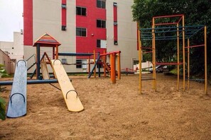 Children’s play area – outdoor - Apto Magnífico com Piscina (Balneário Camboriú)