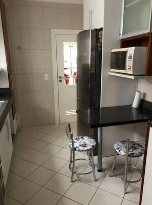 Apartment | Private kitchen | Full-size fridge, microwave, oven, stovetop