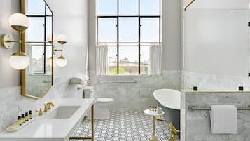Shower, rainfall showerhead, designer toiletries, hair dryer