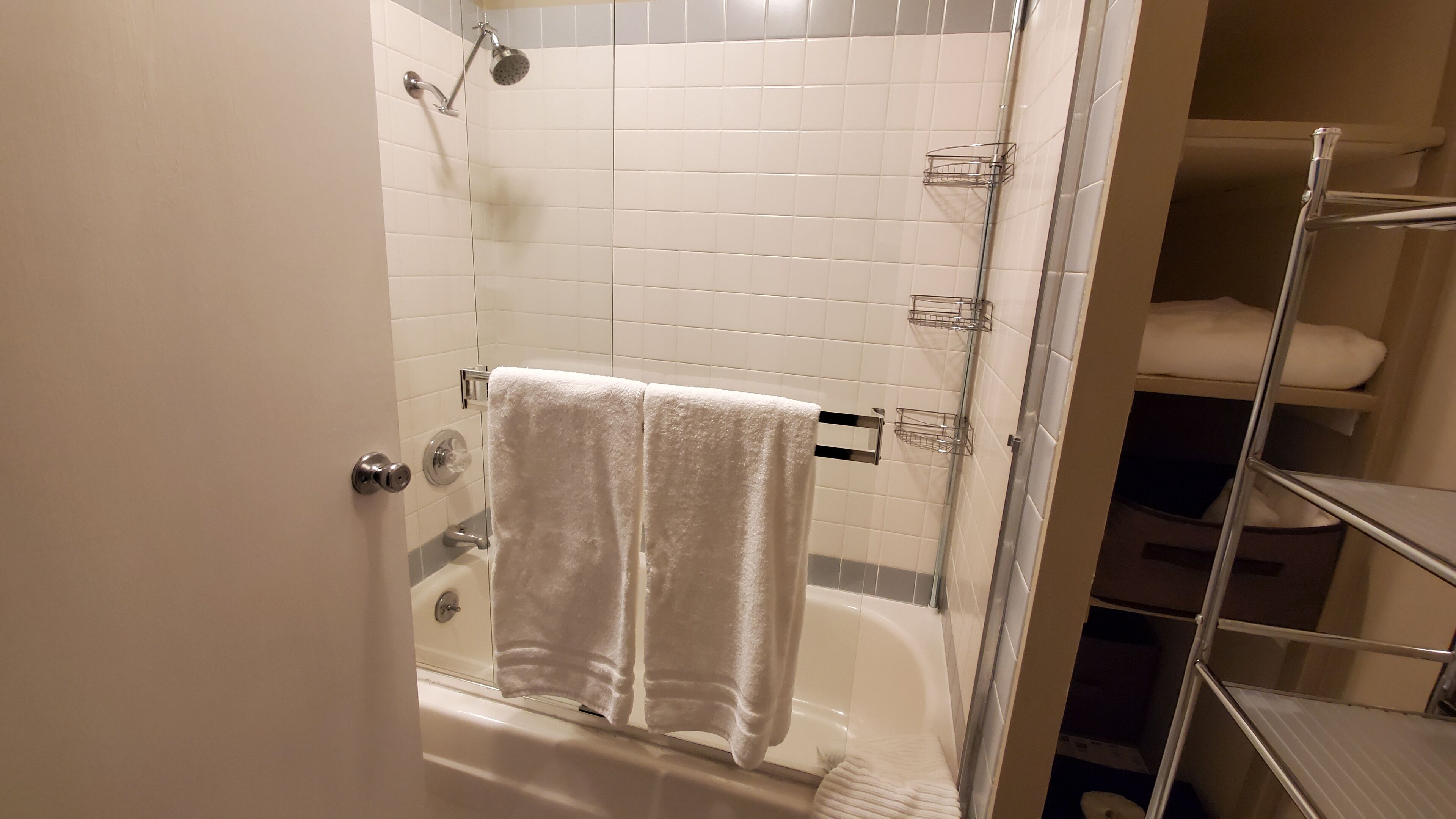 Bathtub, hair dryer, towels, soap