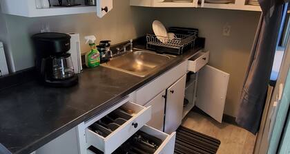 2 bedroom / 1 bath entire house across from the food trucks of the Aloha mall!