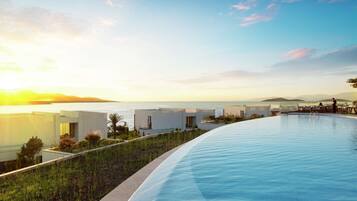 Piscine extérieure (ouverte en saison), tentes de plage