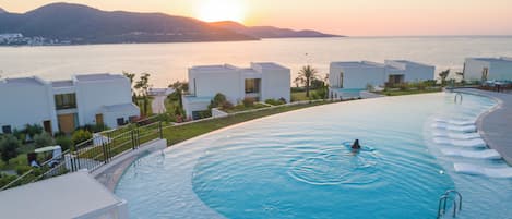 Seasonal outdoor pool, pool cabanas (surcharge), pool umbrellas