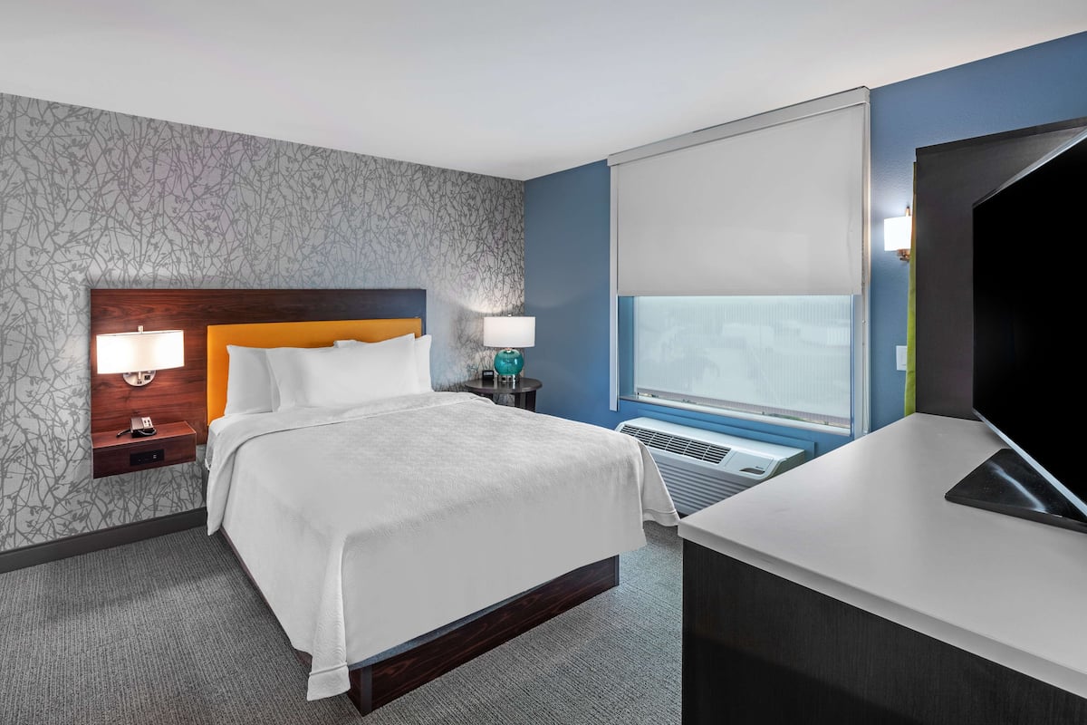 suite, 1 bedroom, non smoking | desk, laptop workspace, blackout curtains, iron/ironing board