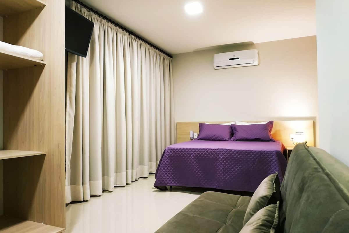 Tremannsrom – deluxe | Minibar, safe på rommet, wi-fi (inkludert) og sengetøy