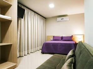 Chambre Triple Deluxe | Minibar, coffres-forts dans les chambres, Wi-Fi gratuit, draps fournis