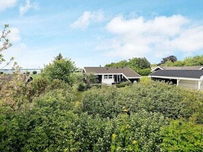 Hus | Utsikt mot vann