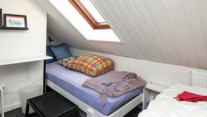 1 kamar tidur dan tempat tidur bayi