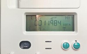 A digital display with the reading '001 1984 kWh h'.