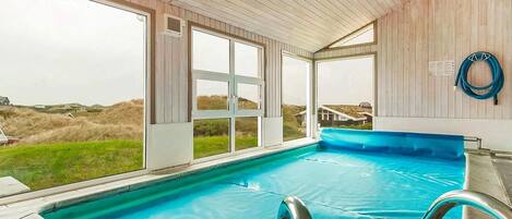 Huis | Zwembad | Een binnenzwembad, een buitenzwembad