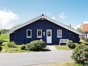 A single-story house with a gabled roof, a front door, and two windows. - Holiday Home in Otterndorf (Otterndorf)