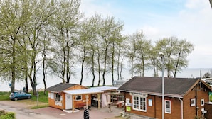Hus | Utsikt mot vann