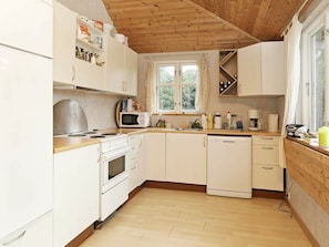 Fridge, stovetop, dishwasher, coffee/tea maker