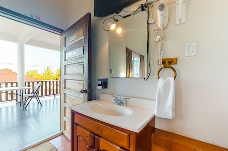 Interior. Cozy studio near town with an ocean view, free WiFi, partial AC & shared deck