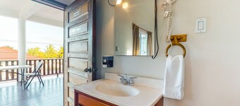 Cozy studio near town with an ocean view, free WiFi, partial AC & shared deck