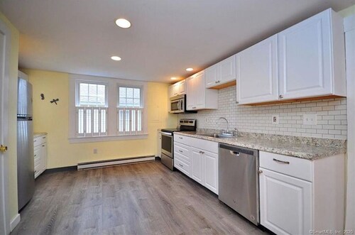 Lovely 3 BR Beach house with beach just a 1 block walk away