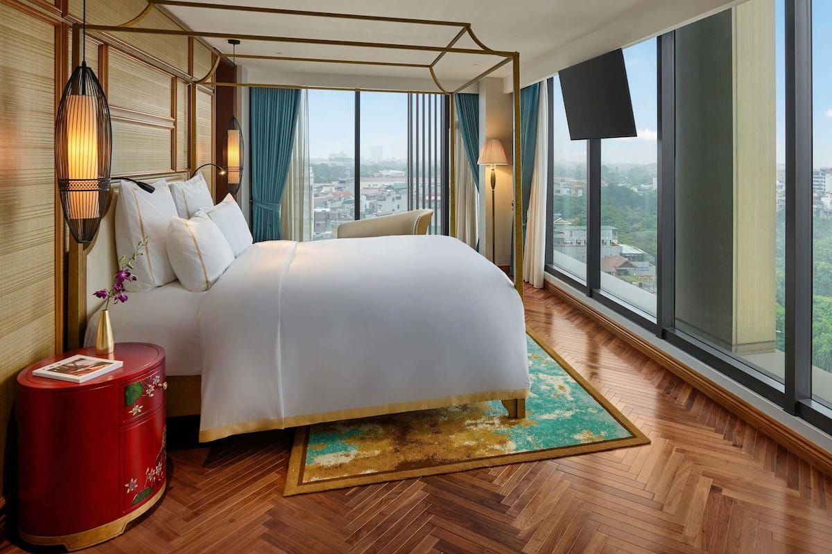 Suite Deluxe, 1 cama King size, con acceso al salón lounge del club | Ropa de cama hipoalergénica y minibar