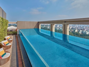 Outdoor pool, free pool cabanas, pool umbrellas