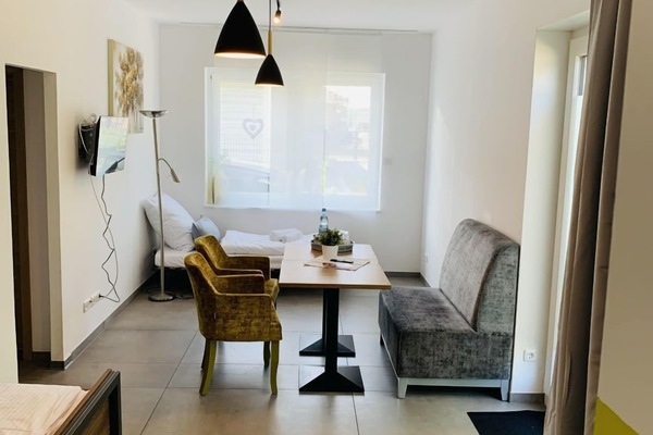Basic Quadruple Room | Hypo-allergenic bedding, minibar, desk, laptop workspace
