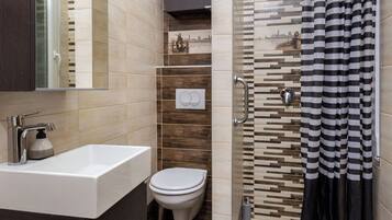 Shower, free toiletries, hair dryer, towels