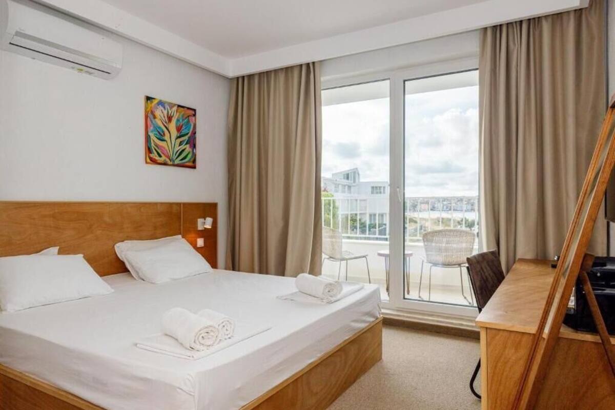 Romantic Double Room, Partial Sea View | Minibar, desk, laptop workspace, soundproofing